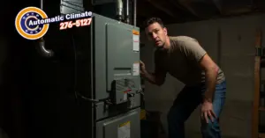 Richmond homeowner concerned about HVAC system making strange or loud noises, inspecting furnace unit.